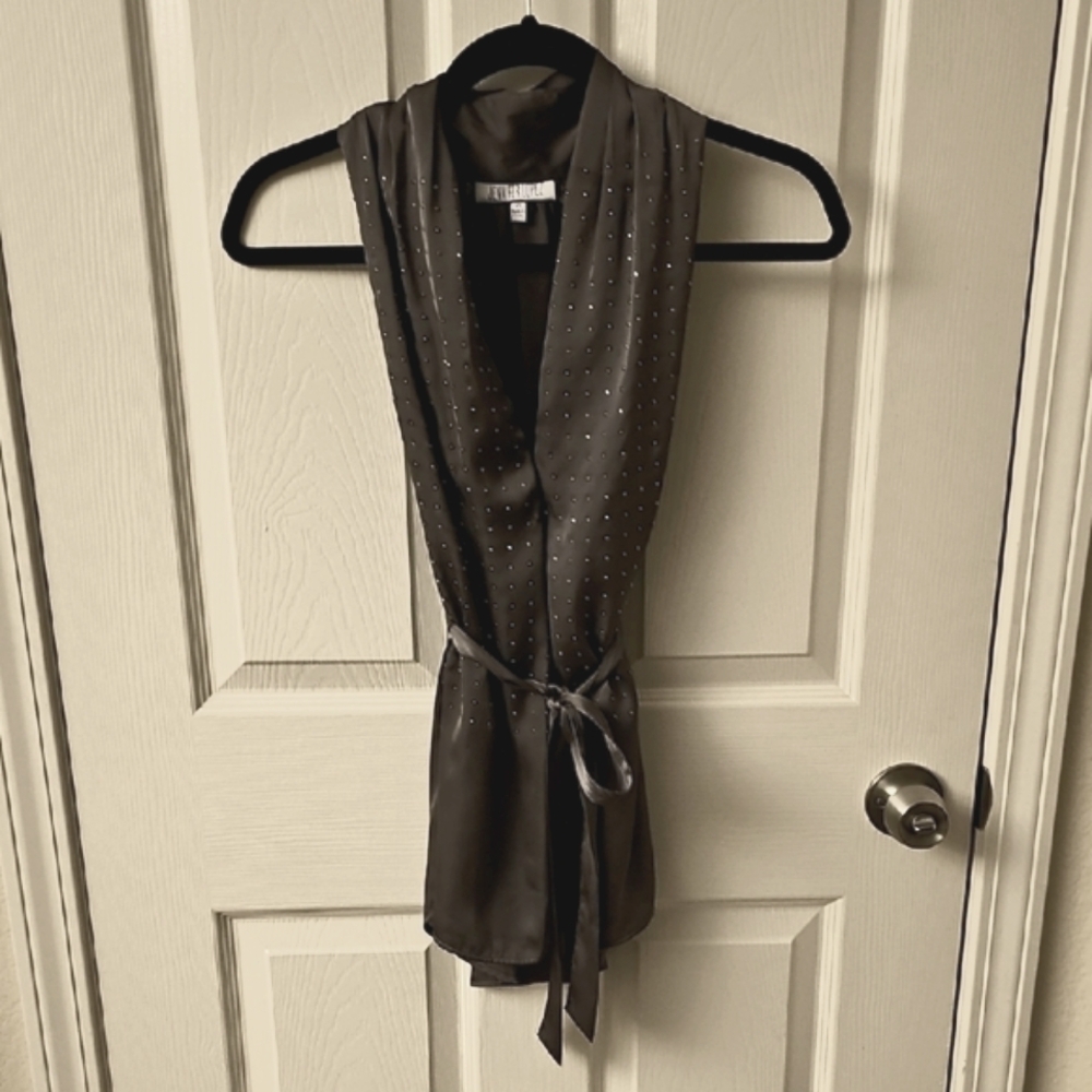 Jennifer Lopez Elegant Charcoal Sleeveless Top with Silver Studded Detail.